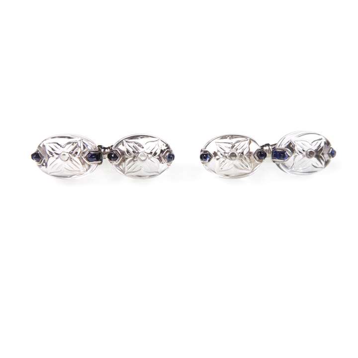 Pair of rock crystal and sapphire cufflinks of ovoid form